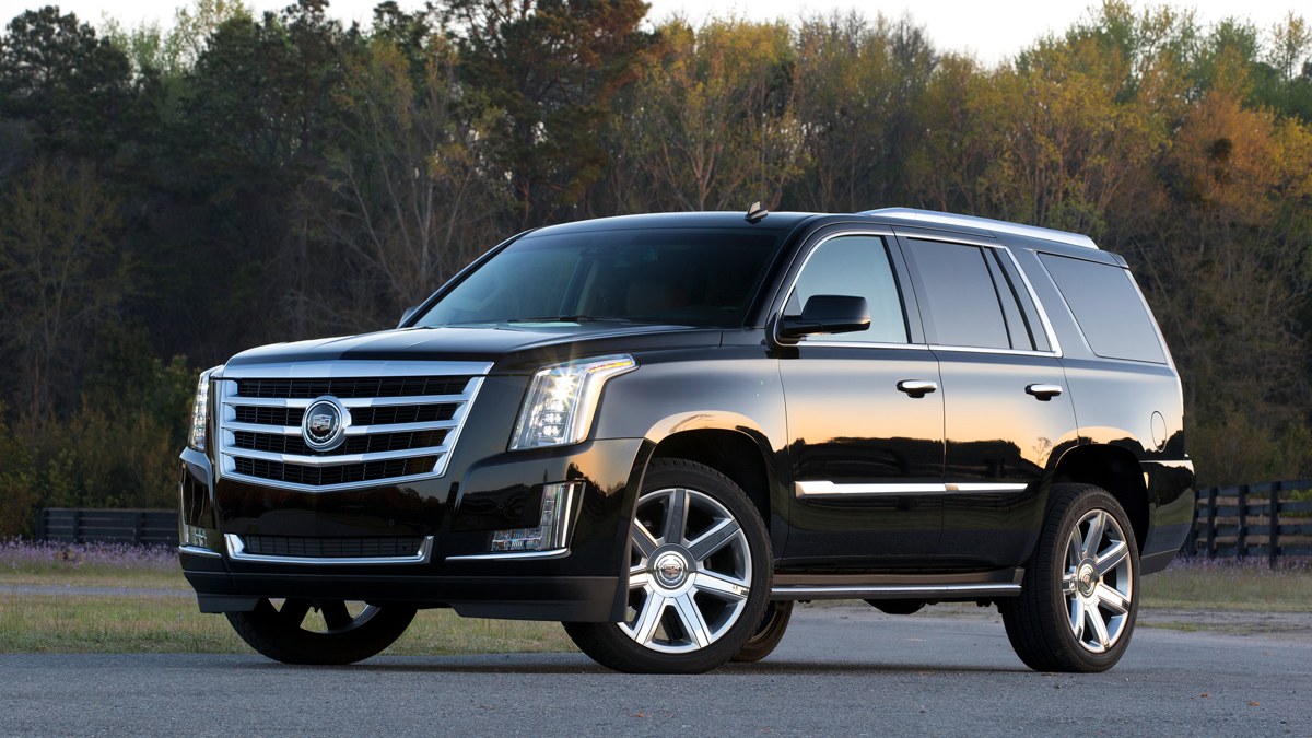 Black 2015 Cadillac Escalade posed and parked