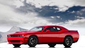 A 2015 Dodge Challenger SRT Hellcat shows off its muscle car profile.