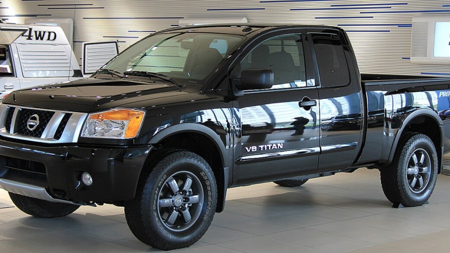 A 2015 Nissan Titan full-size truck sits in a display room.