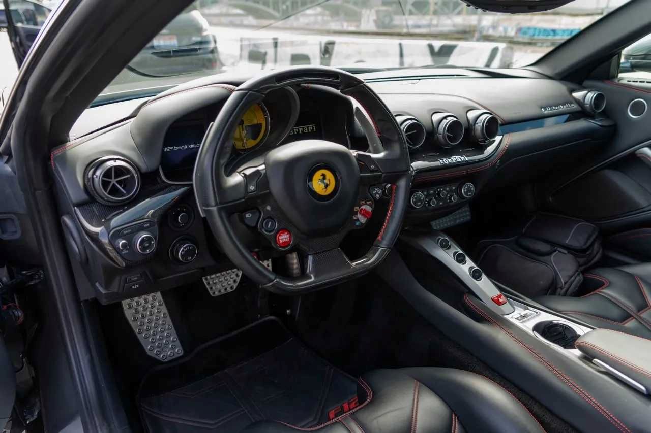 The 2016 Ferrari F12 has a complicated steering wheel