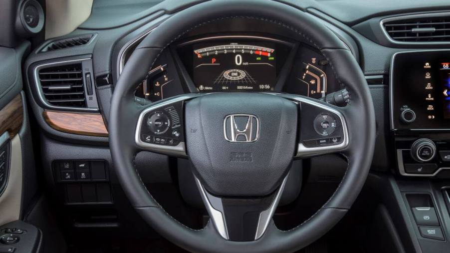 2017 Honda CR-V steering wheel and driver's display with cabin Maintenance Minder codes