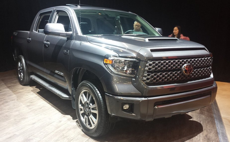 A 2018 Toyota Tundra full-size truck sits on display at an auto show.
