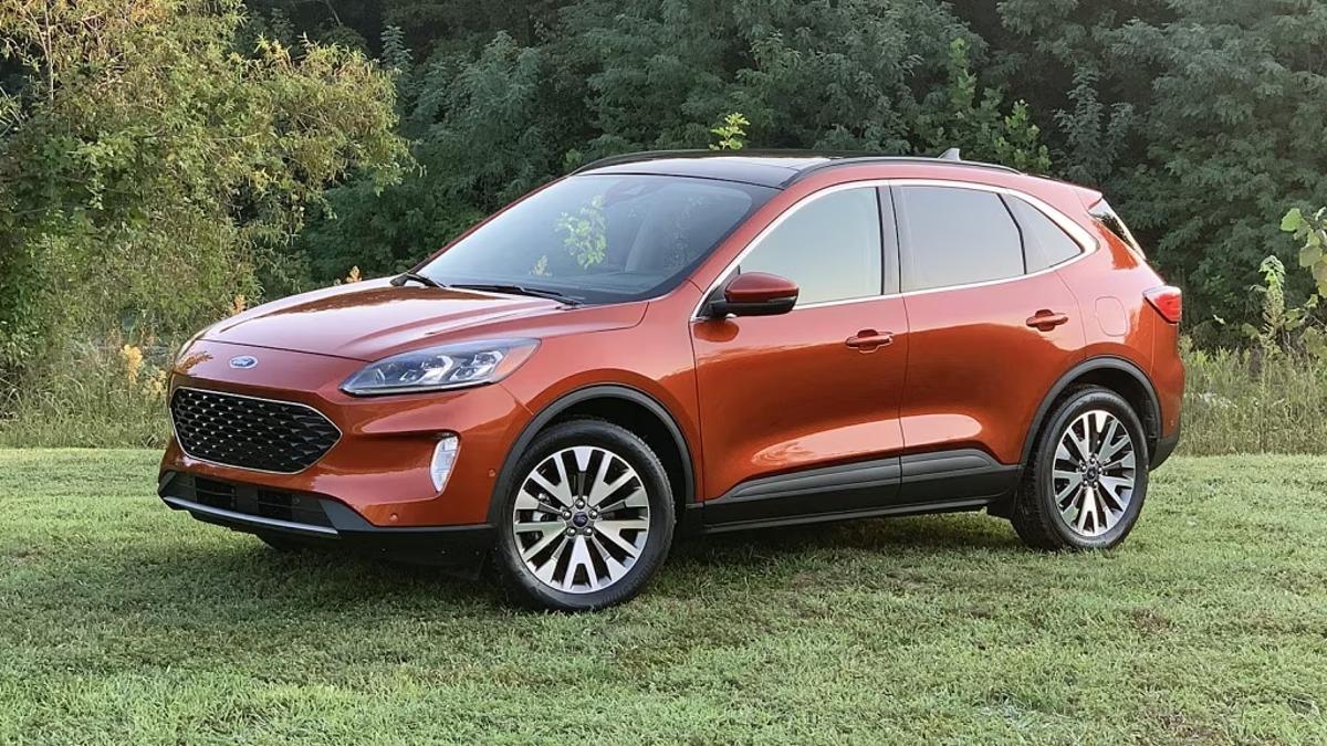 2020 Ford Escape in Orange Posed on a Grassy Lawn