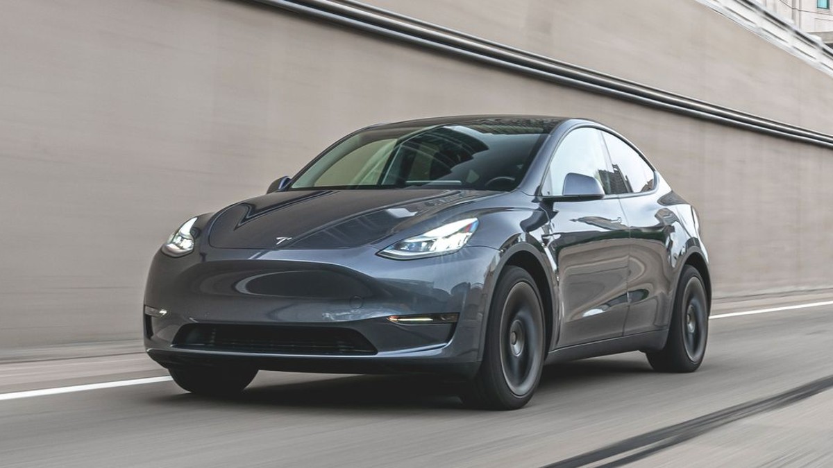 Gray 2020 Tesla Model Y driving 
