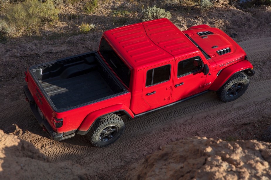 Bird's eye view of a red Jeep Gladiator truck with its short pickup bed.