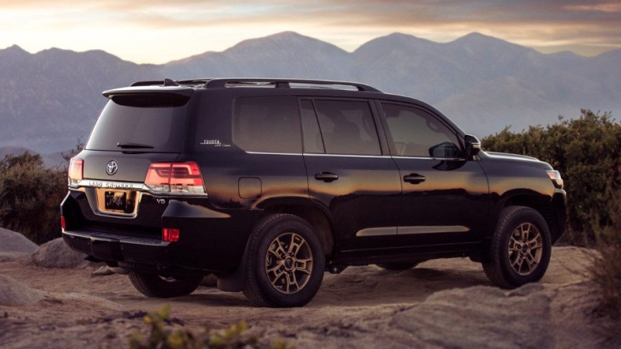 A black 2021 Toyota Land Cruiser is parked outdoors.