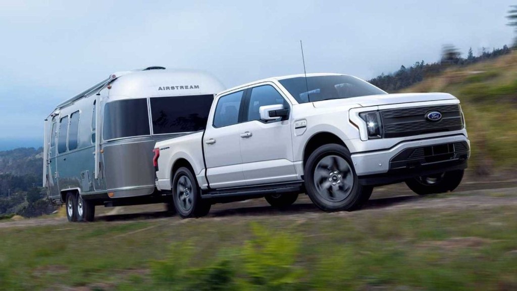 Ford's electric truck, the 2023 F-150 Lightning tows a trailer.