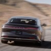 A 2022 Lucid Air Grand Touring driving down a highway.