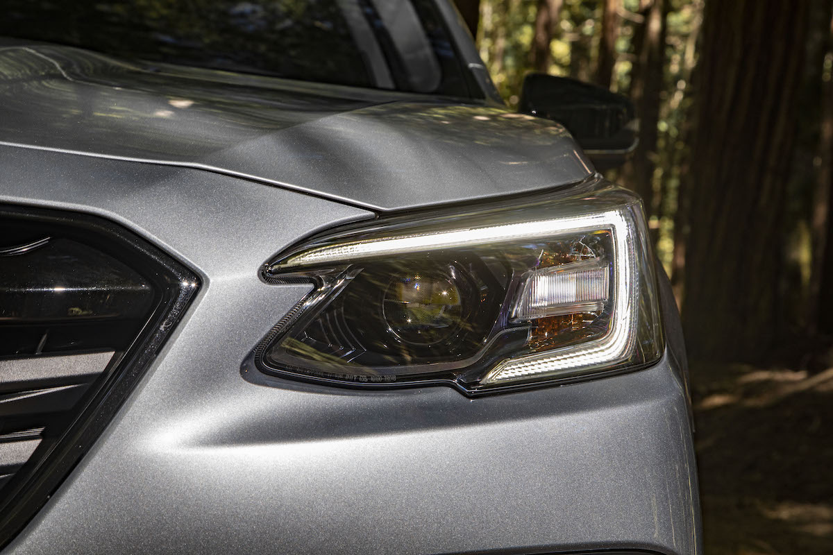 A silver 2022 Subaru Outback headlight. The 2022 Outback is one of the best Subaru vehicles.