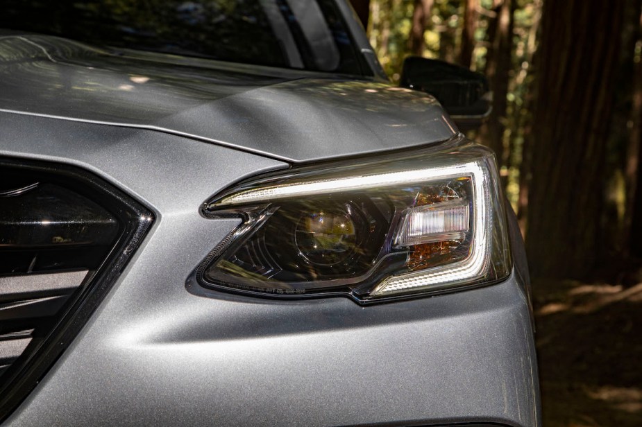 A silver 2022 Subaru Outback headlight. 