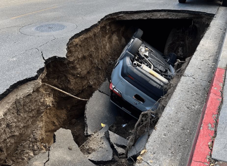 2022 Toyota RAV4 in a sinkhole