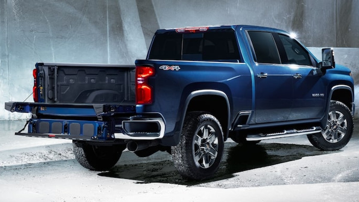 Blue 2023 Chevy Silverado HD Posed - Notice the rear and side steps