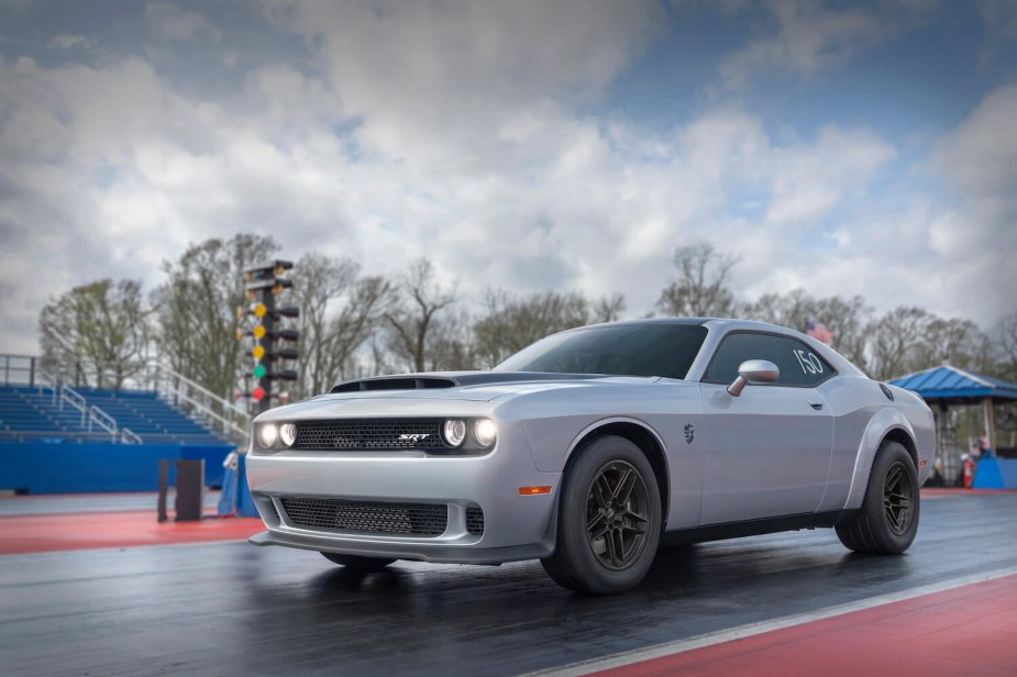 Dodge's 2023 "Last Call" Challenger Demon 170 super muscle car parked on a drag strip for an advertising photo.