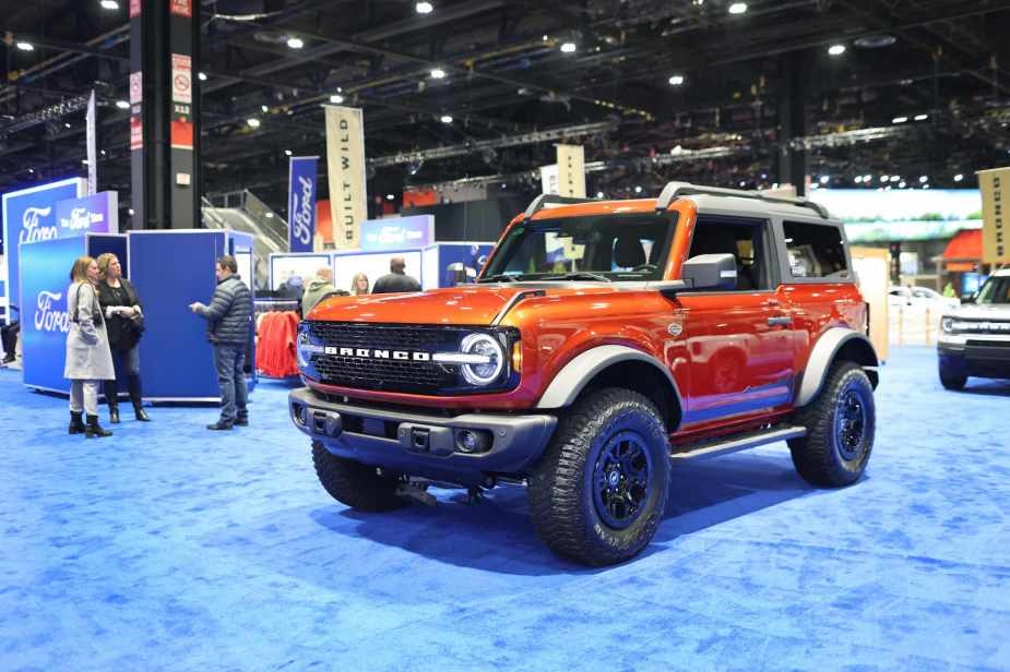 2023 Ford Bronco in red at an Auto show
