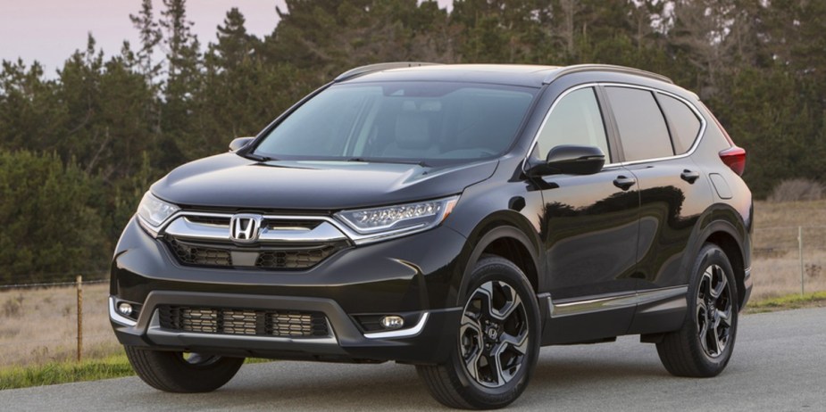 A black 2019 Honda CR-V small SUV is parked. 