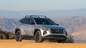Silver 2023 Hyundai Tucson on a valley cliff. The Tucson is one of the most popular Hyundai SUVs.