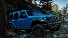 blue 2023 Jeep Wrangler Rubicon 392 on rocks