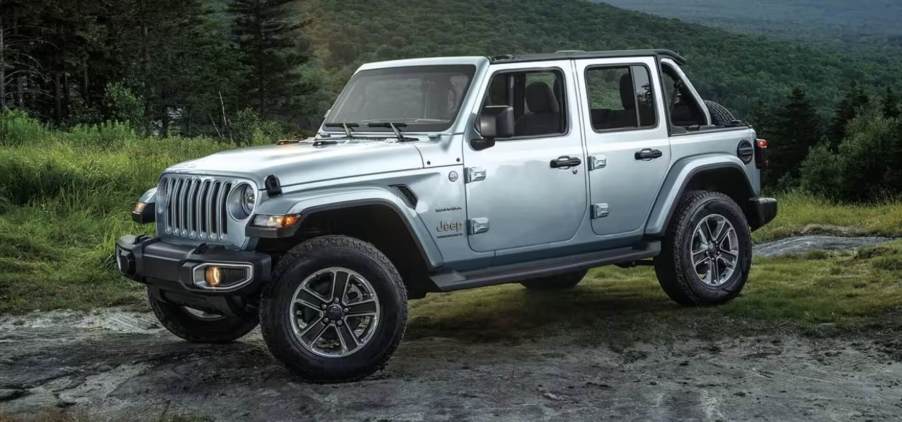 The 2023 Jeep Wrangler driving down the road