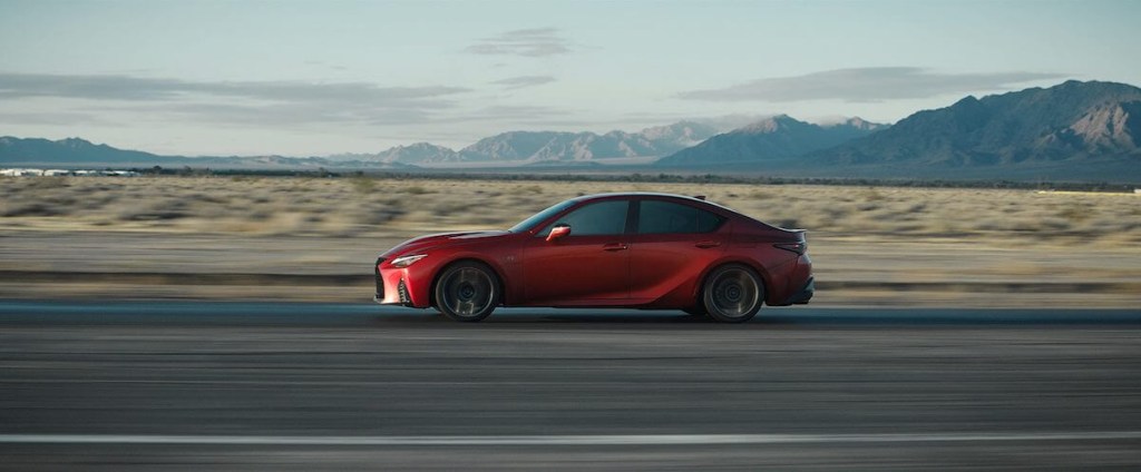 A side view of a red 2023 Lexus IS 500