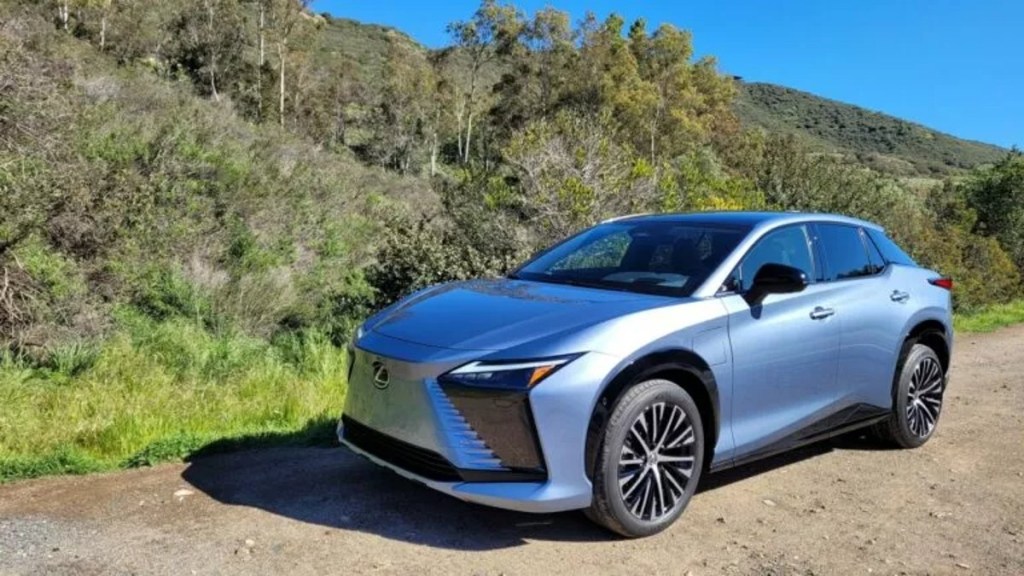 2023 Lexus RZ 450e Parked and Posed Next to a Hill