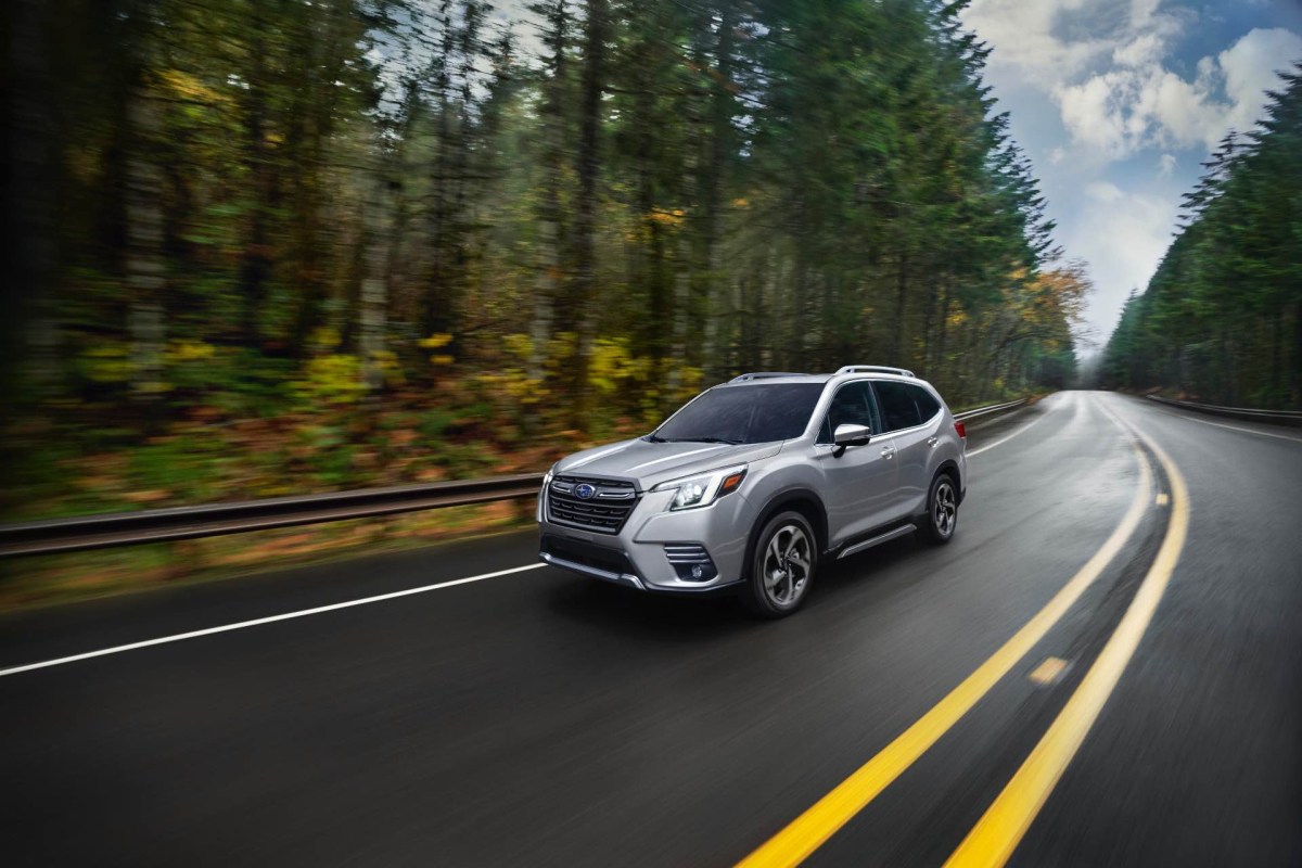 A silver 2023 Subaru Forester on the road. In driving mechanics, it's a strong 2023 Toyota RAV4 alternative.