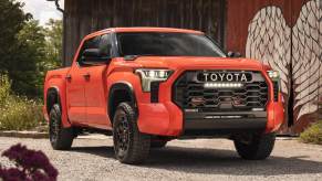 The 2023 Toyota Tundra parked near a home