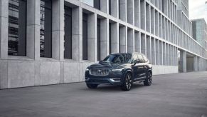A 2023 Volvo XC90 parked outside of a building.