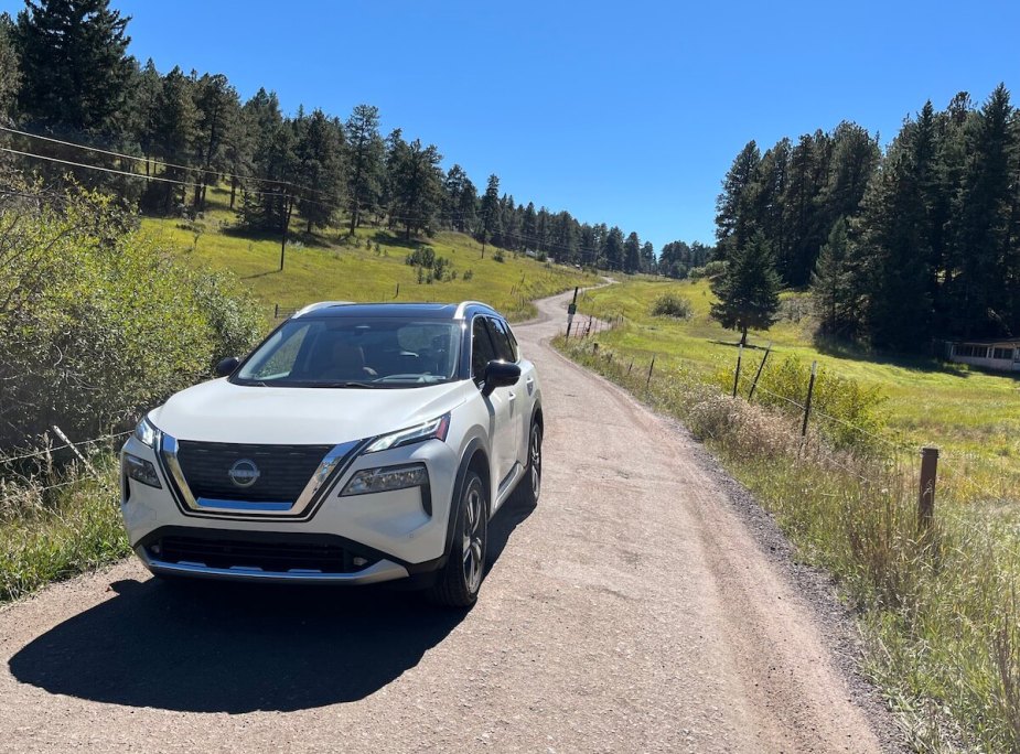 2023 Nissan Rogue front view on a dirt road