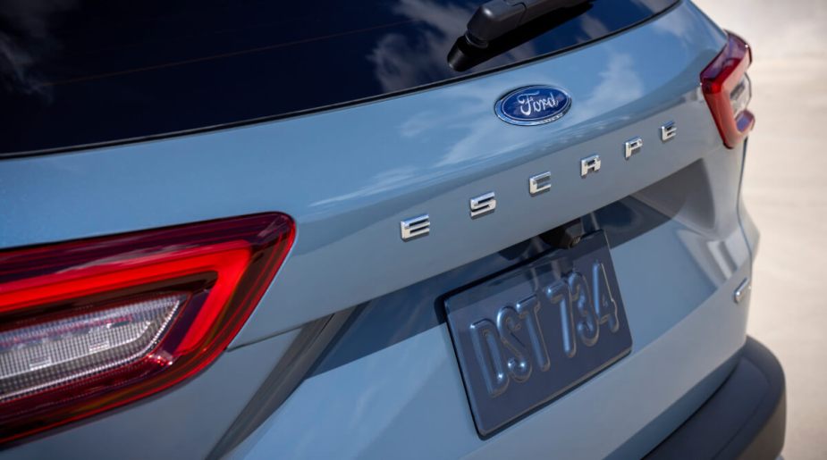 The rear lift gate of a 2023 Ford Escape PHEV in light blue.