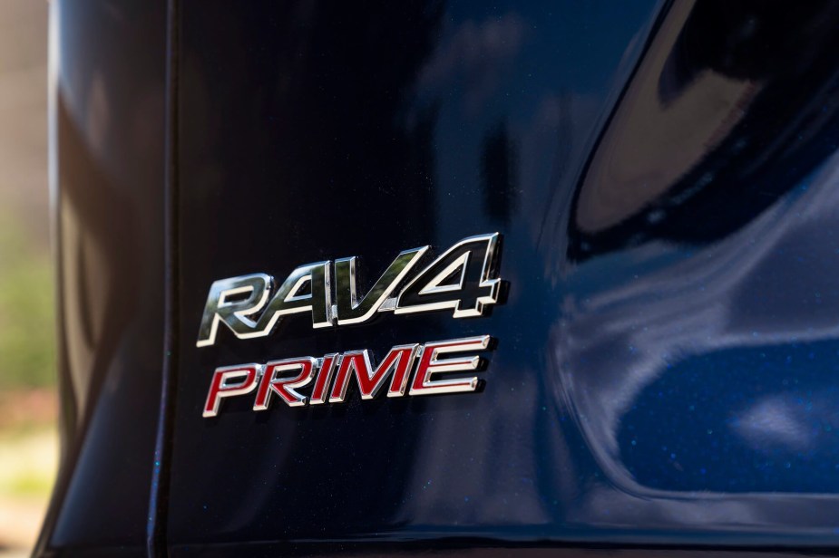 Close up image of a Toyota RAV4 plug-in hybrid SUV badge. 