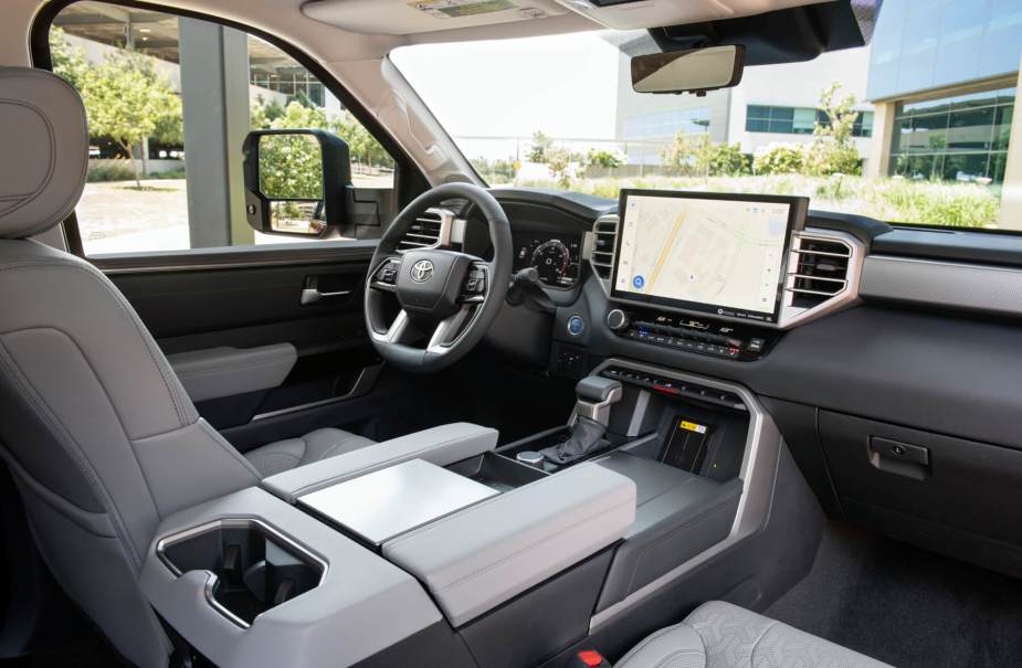 The front cabin view of a 2023 Toyota Sequoia SUV in grey trim. 