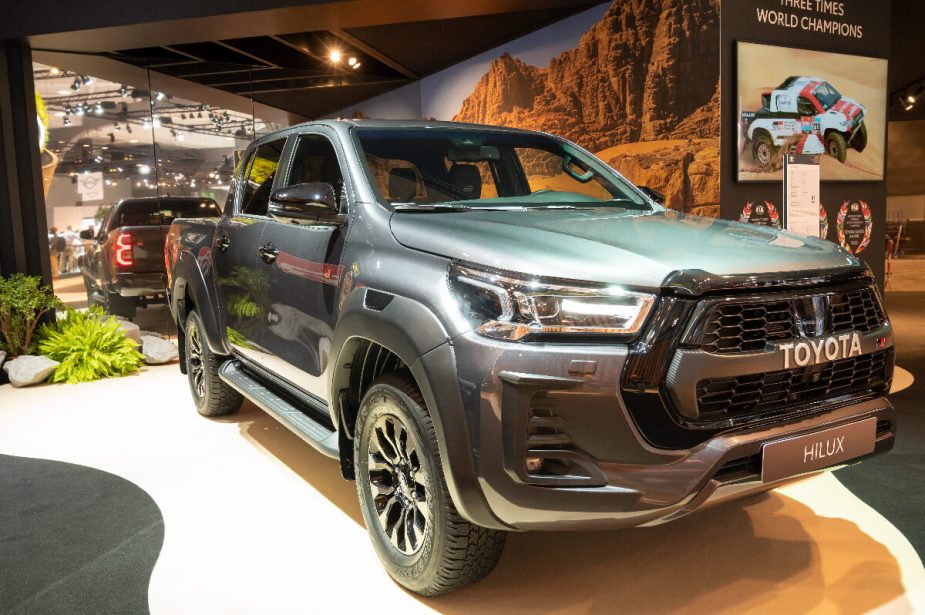 A grey 2023 Toyota Hilux shows off as a midsize truck.