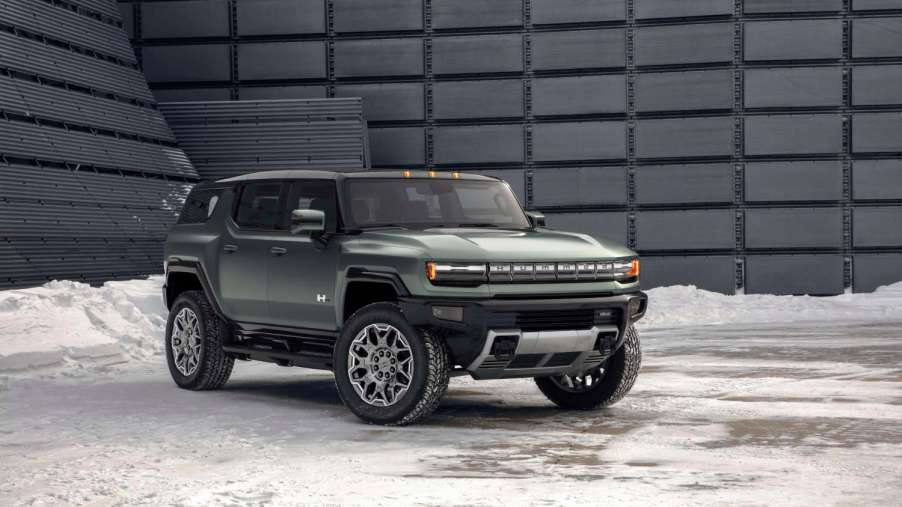 The 2024 GMC Hummer EV SUV parked in the snow