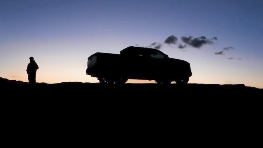 The 2024 Toyota Tacoma teaser with the outline of the new Tacoma