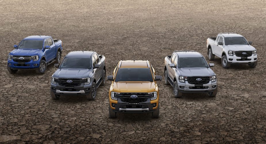 A group of 2024 Ford Ranger midsize trucks show off new design.