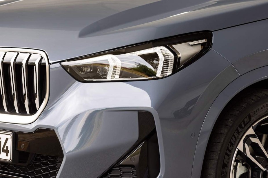 A BMW X1 headlight closeup, which is one of the best BMW SUVs.