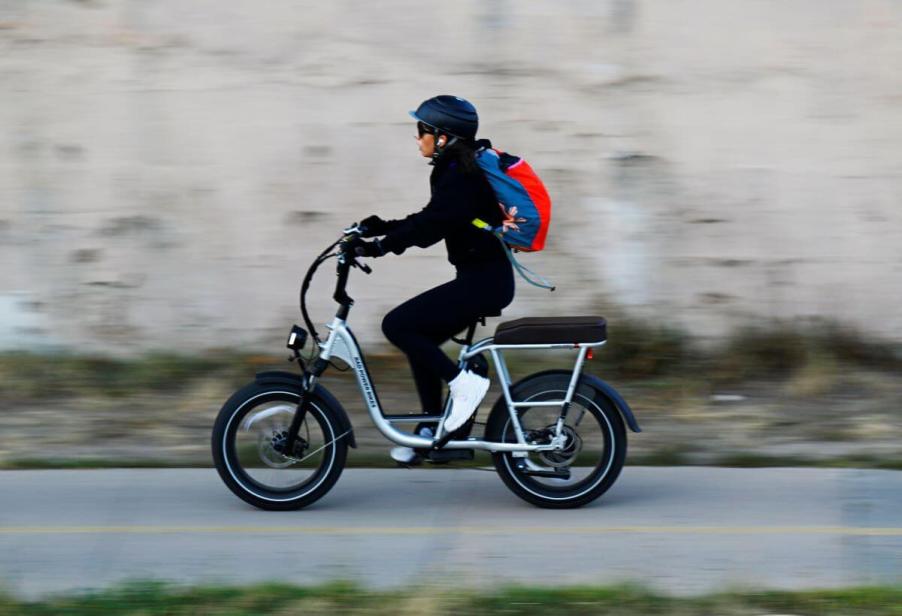 A speedy white electric bike (e-bike) being driven in Denver, Colorado