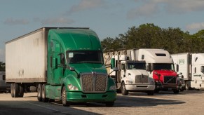 A group of semi-trucks parked, diesel trucks could be illegal in California soon.