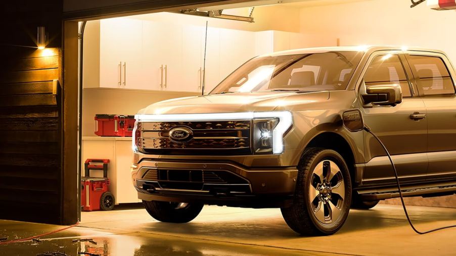 A Ford F-150 Lightning electric truck is getting charged.