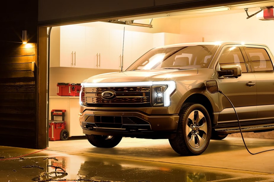 A Ford F-150 Lightning electric truck is getting charged.