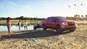 As a truck with a towing recall, the 2023 Ford Maverick sits at a beach.