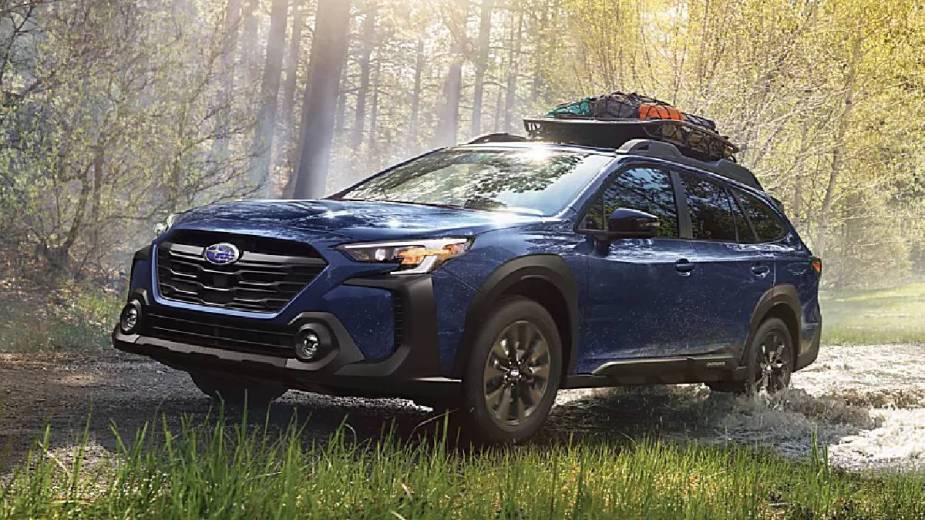 Front angle view of blue 2023 Subaru Outback crossover SUV