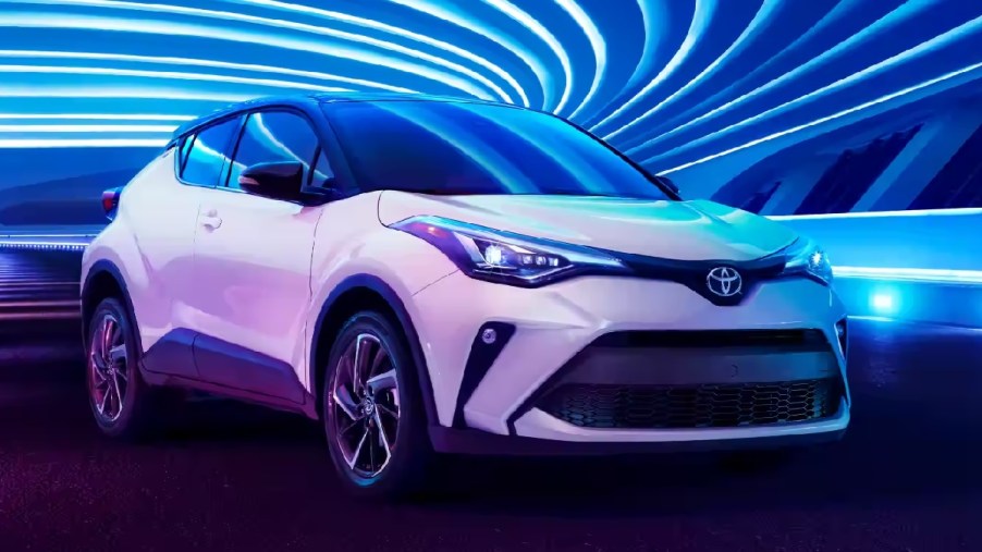 Front angle view of white 2022 Toyota C-HR, 2023 J.D. Power most reliable car, which will be killed
