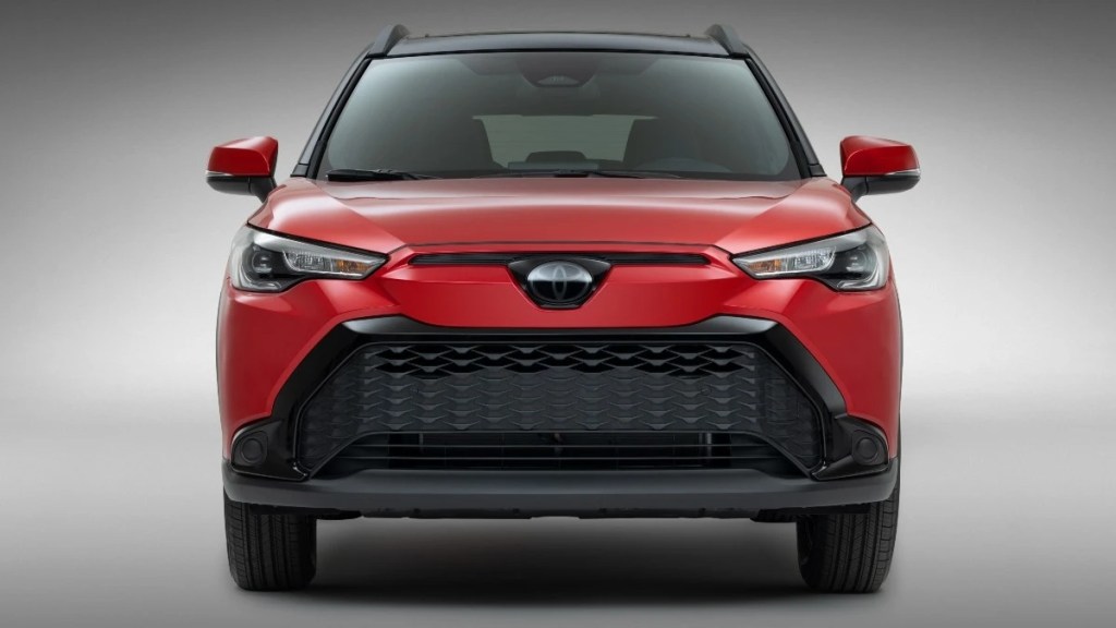 Front view of red 2023 Toyota Corolla Cross crossover SUV
