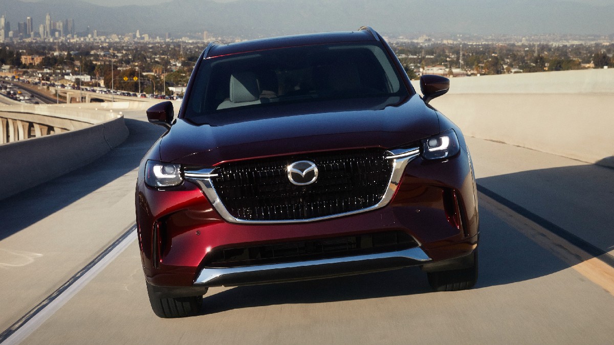 Front view of red 2024 Mazda CX-90 midsize SUV