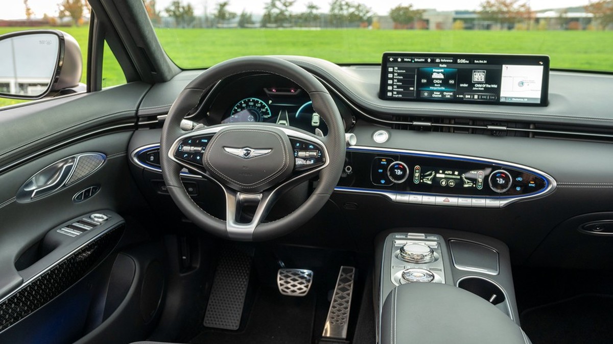 Genesis GV70 dashboard featuring a digital instrument cluster and touchscreen
