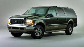A green Ford Excursion