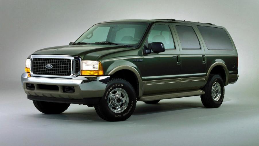 A green Ford Excursion