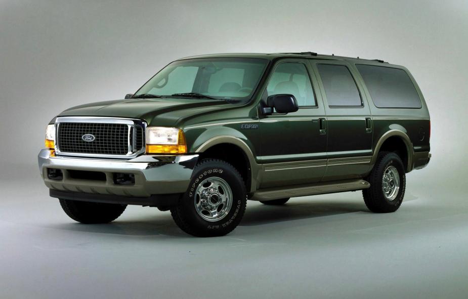 A green Ford Excursion 