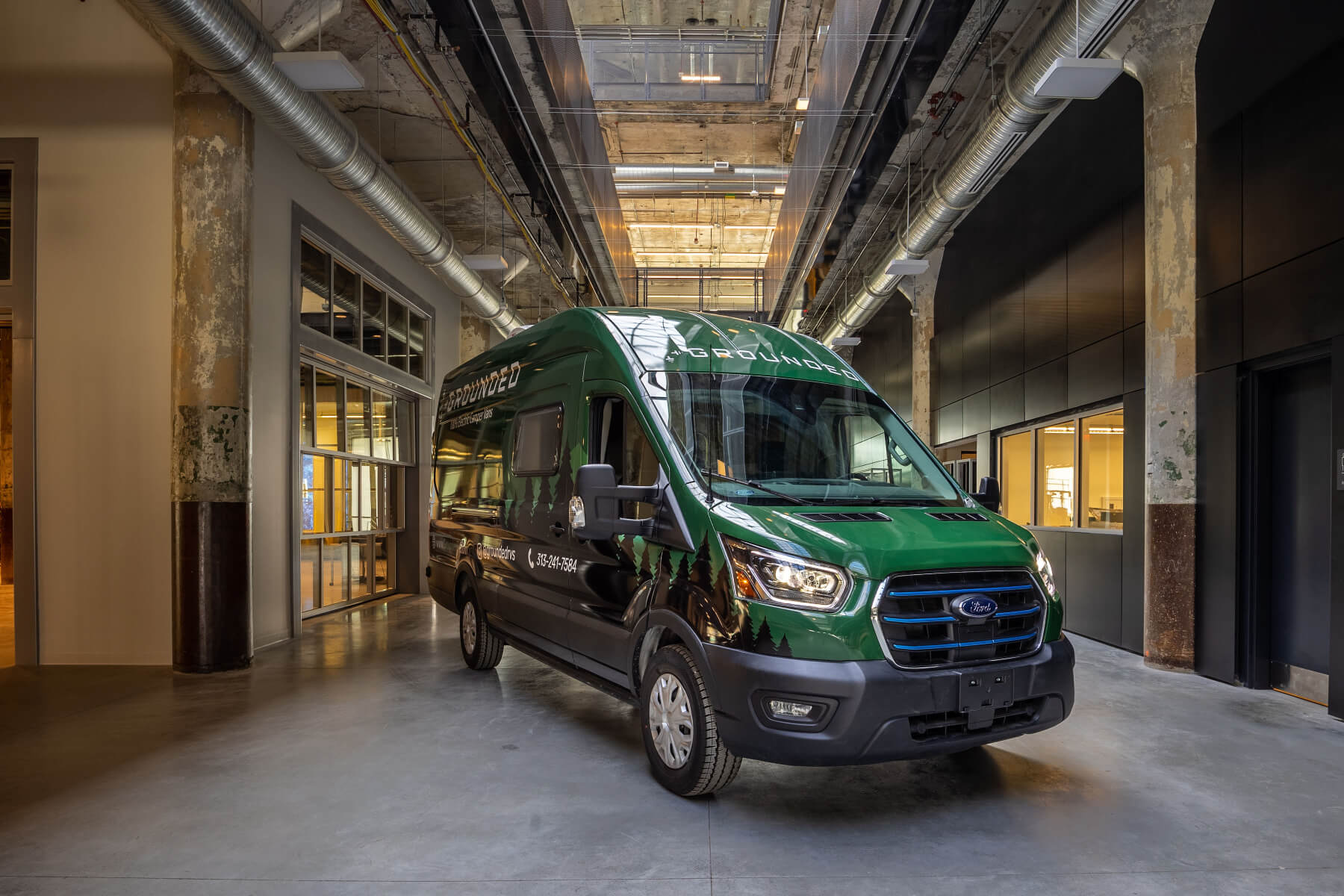 A head-on view of the new Grounded G1 electric camper conversion van.